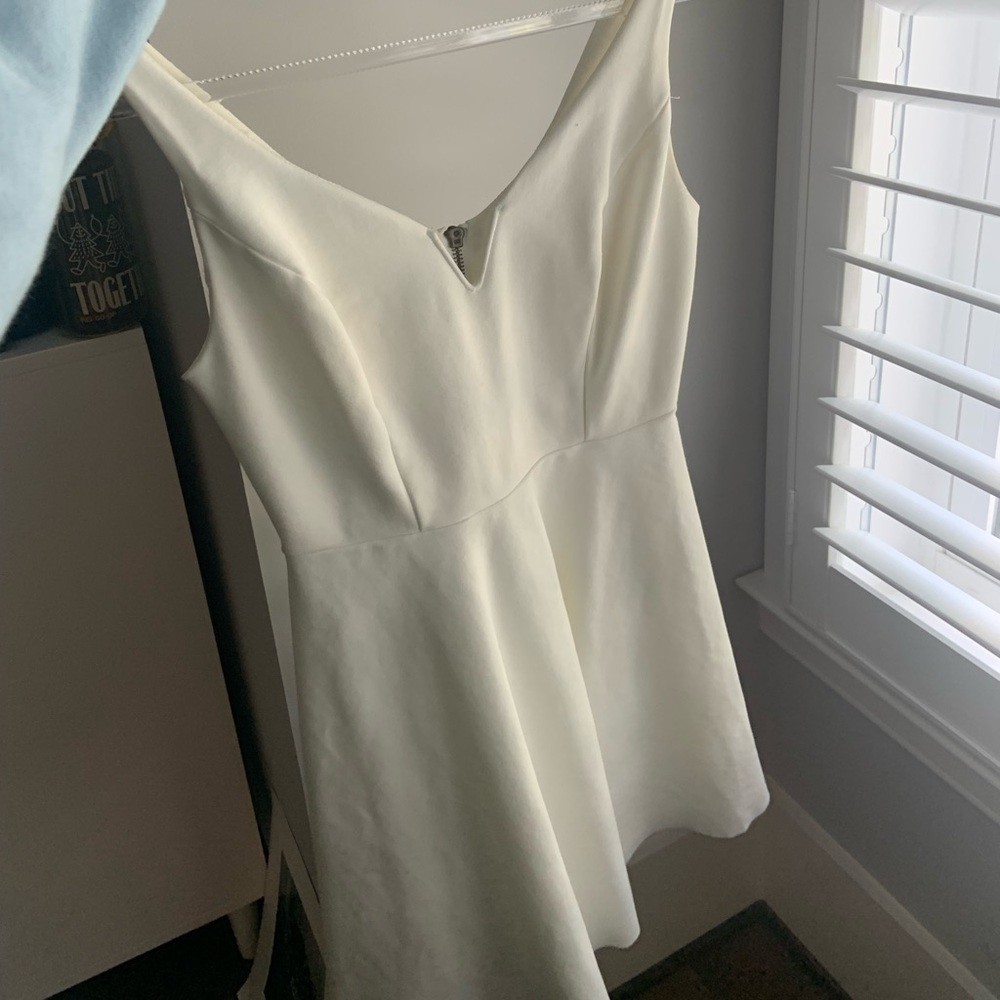 white dress with skater skirt look. originally from urban! dm to offer!